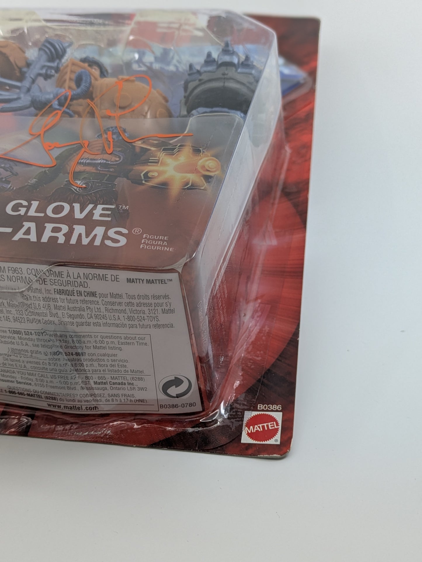 Battle Glove Man-At-Arms - Signed by Garry Chalk in Orange ink