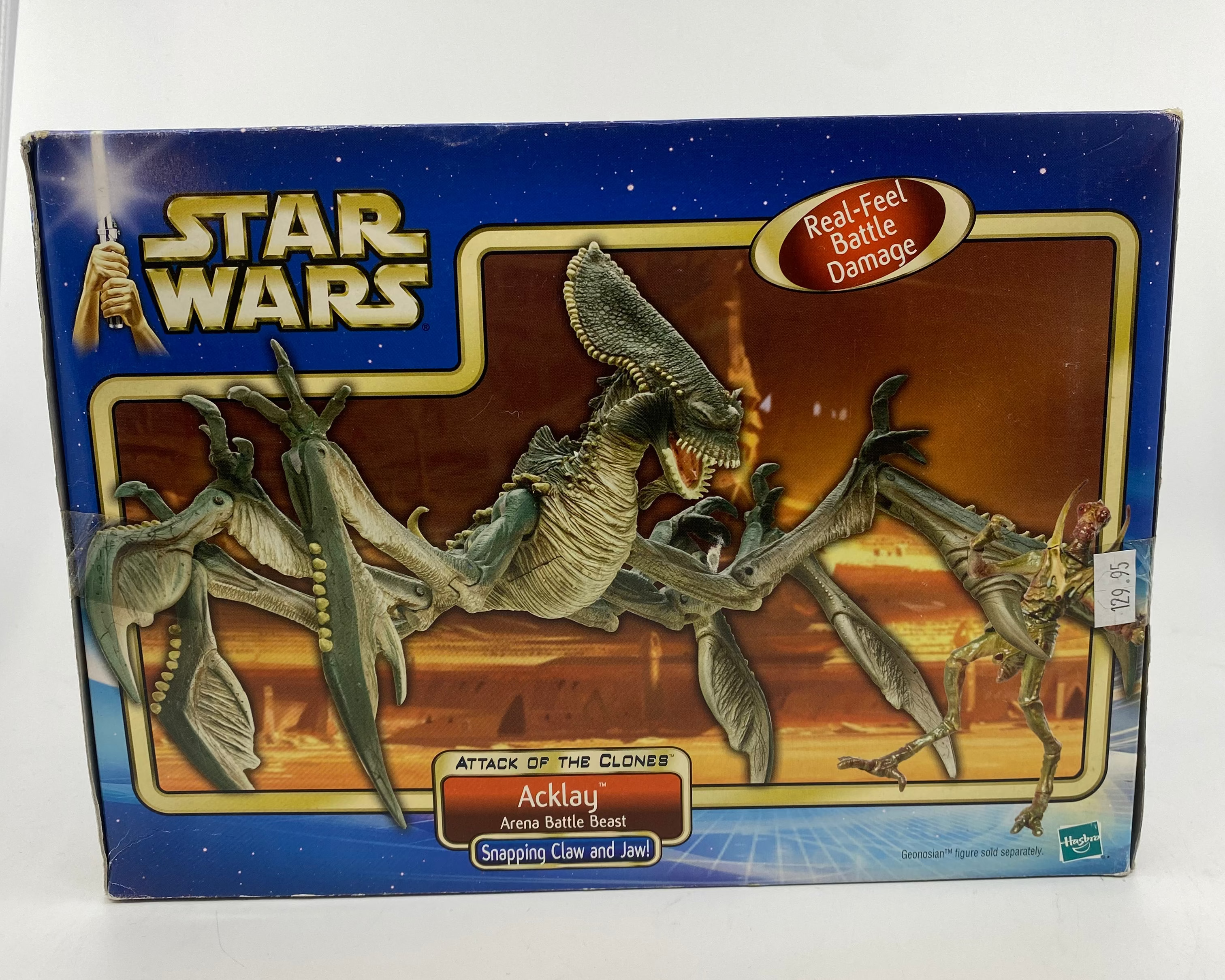 Star Wars toy packaging with figures and desert landscape