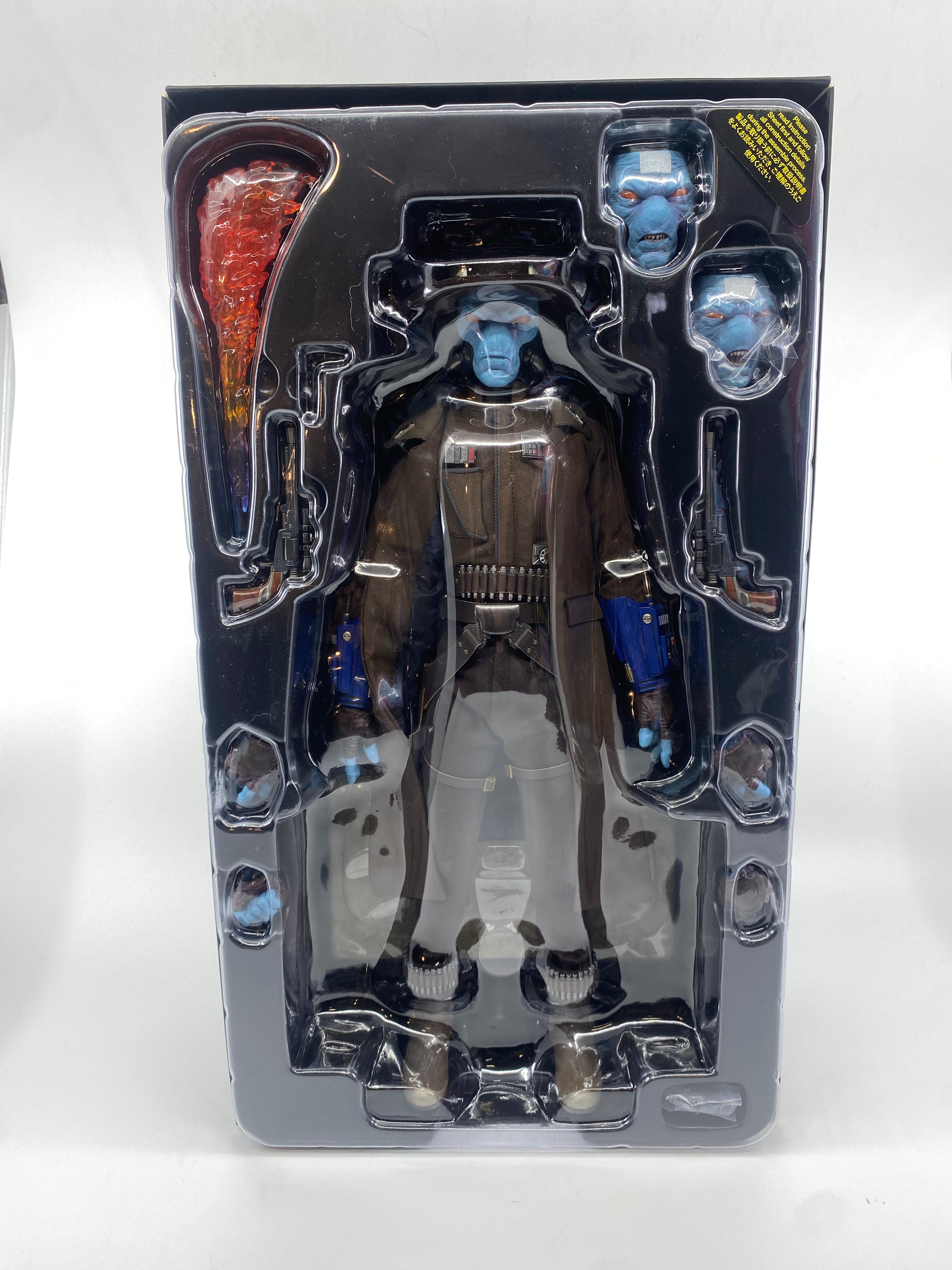 Action figure in packaging on a white background