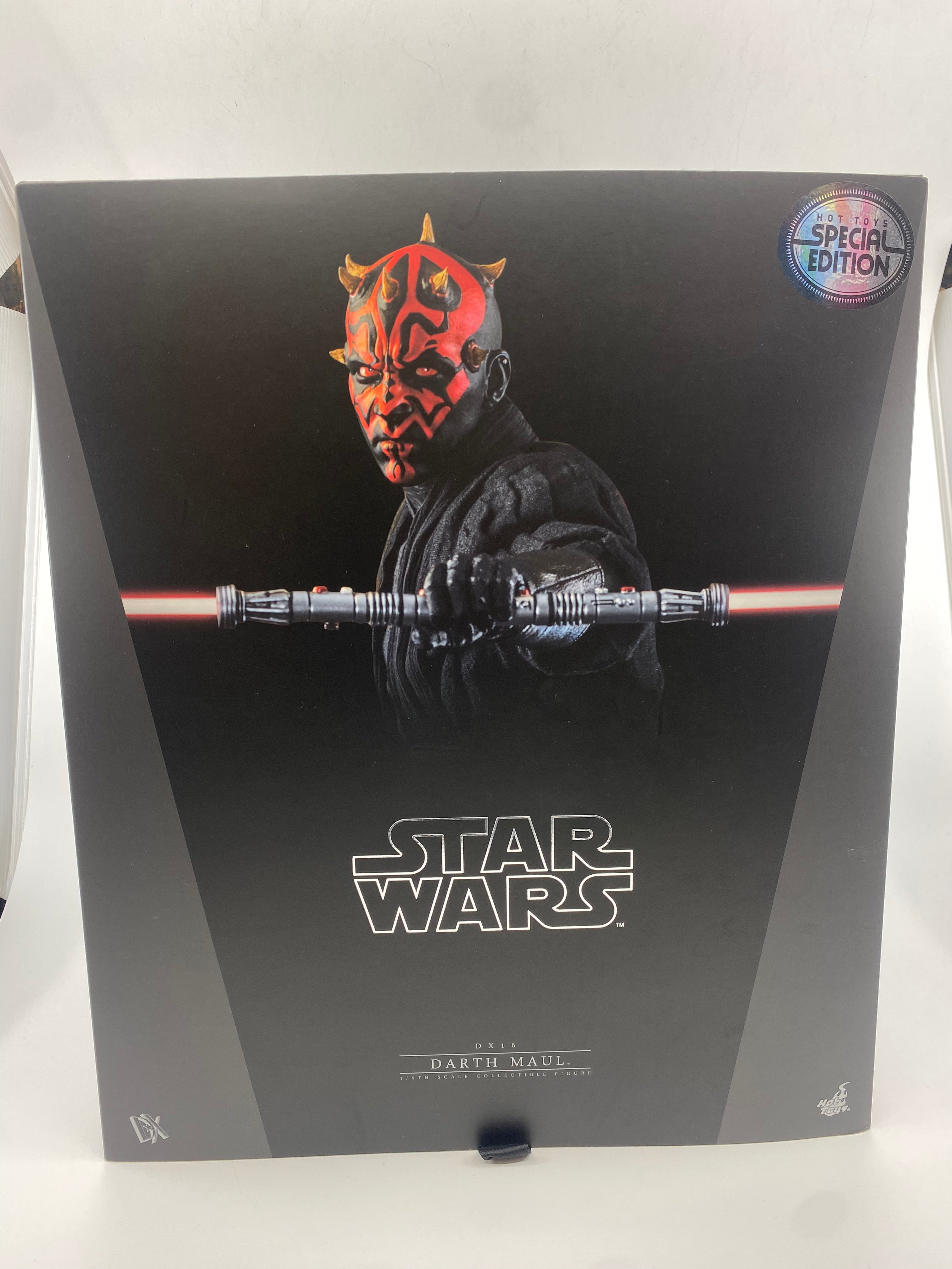 Star Wars action figure packaging with Darth Maul on a black background