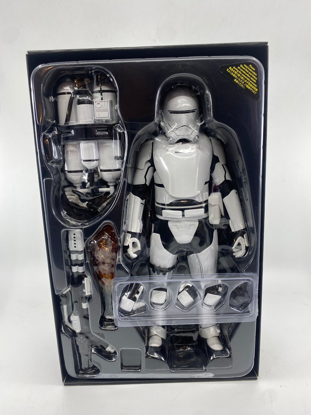 Action figure in packaging on a white background