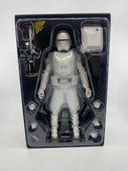Action figure in clear packaging on a white background