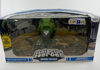 Toy figure in packaging with 'Galactic Heroes' branding on a white background
