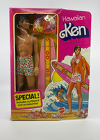 Hawaiian-themed packaging of a vintage toy figure with a surfboard and accessories on a white background.