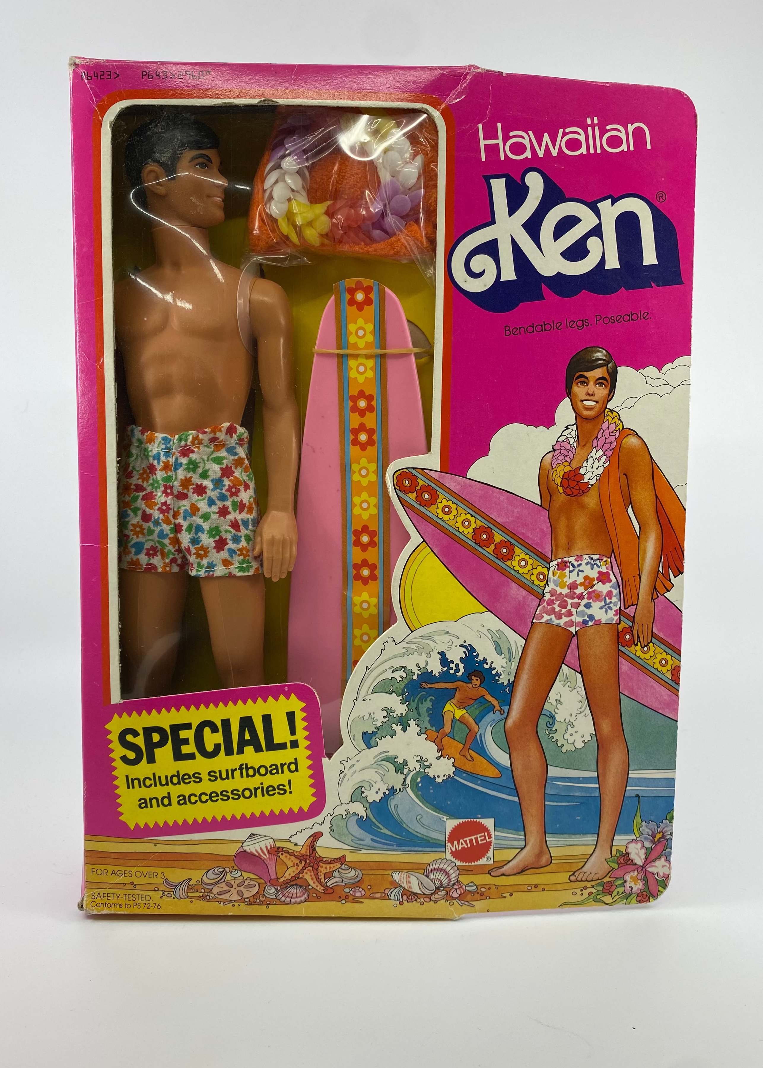Hawaiian-themed packaging of a vintage toy figure with a surfboard and accessories on a white background.