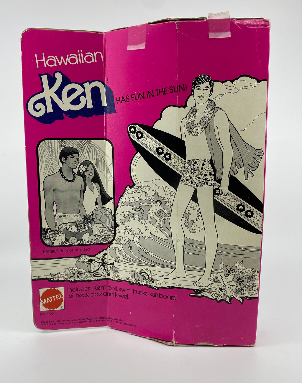 Vintage packaging of a Barbie doll with 'Hawaiian Ken' on a white background