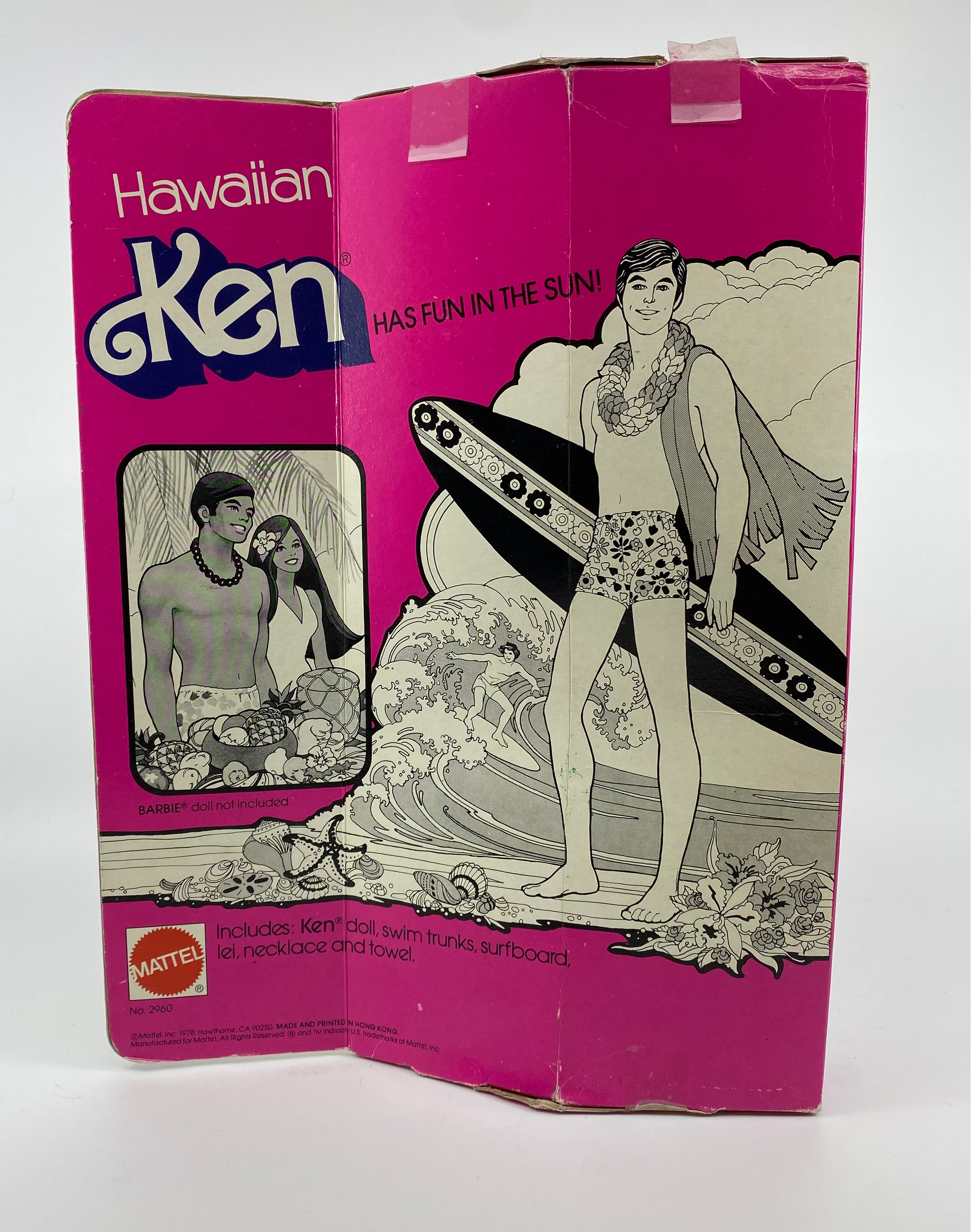 Vintage packaging of a Barbie doll with 'Hawaiian Ken' on a white background