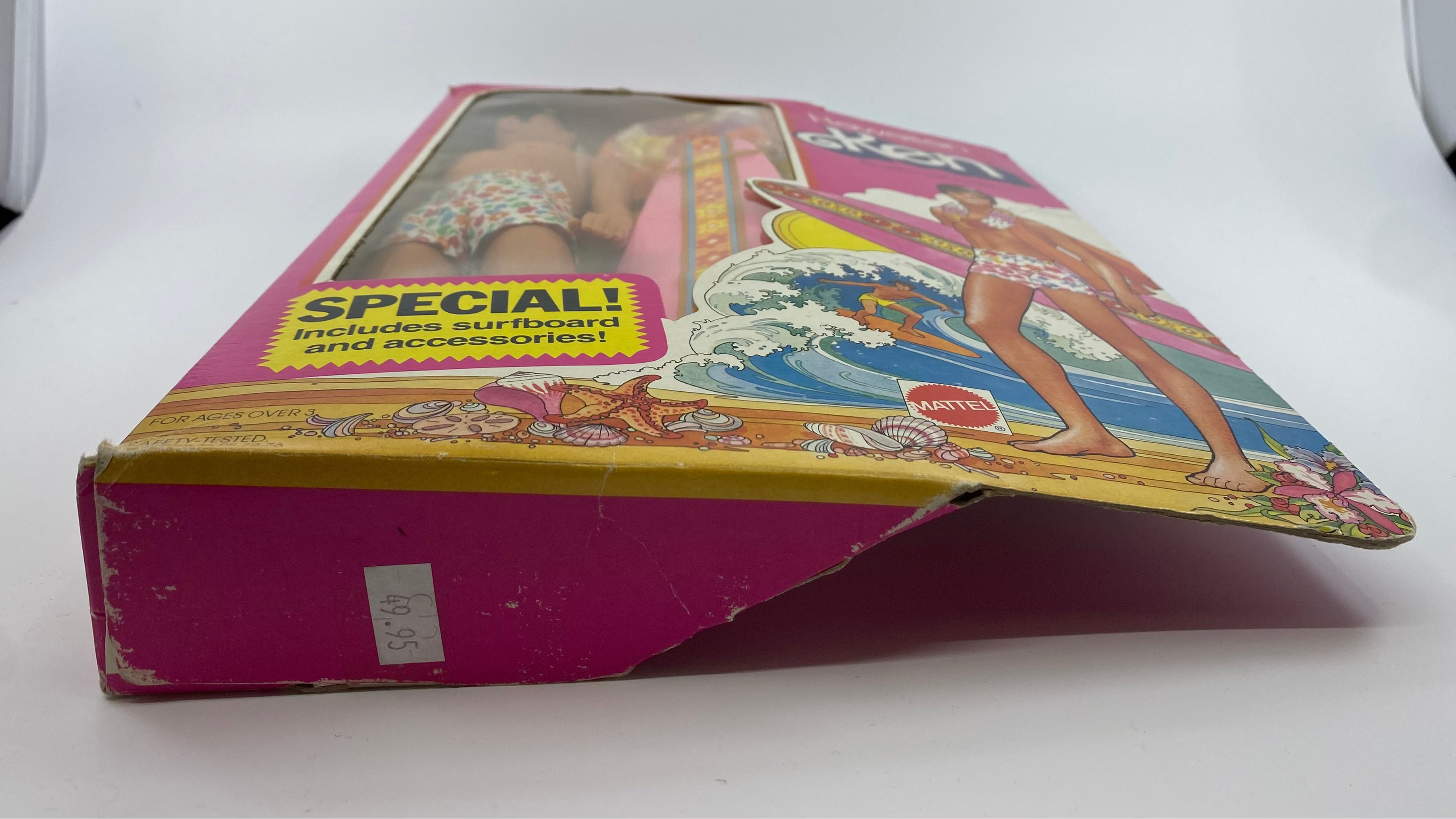 Vintage surfboard packaging with a colorful design on a white background