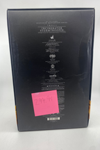 Back of a product box with text and a pink sticky note on a white background
