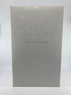 Box with 'Sculpture' and 'Lady of the White Woods' text on a white background