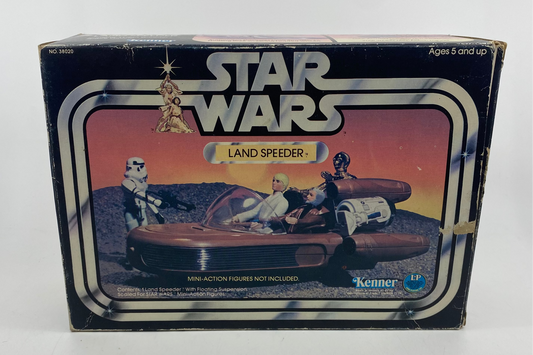 Vintage Star Wars Land Speeder toy box on a white background