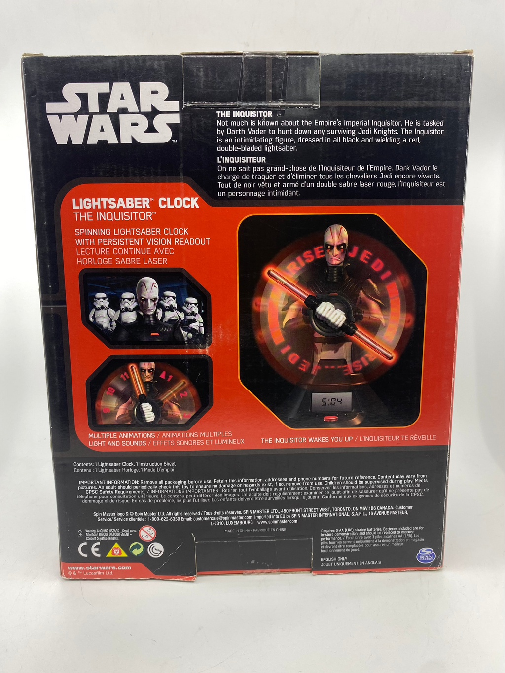Star Wars Lightsaber Clock packaging with character images and text on a white background