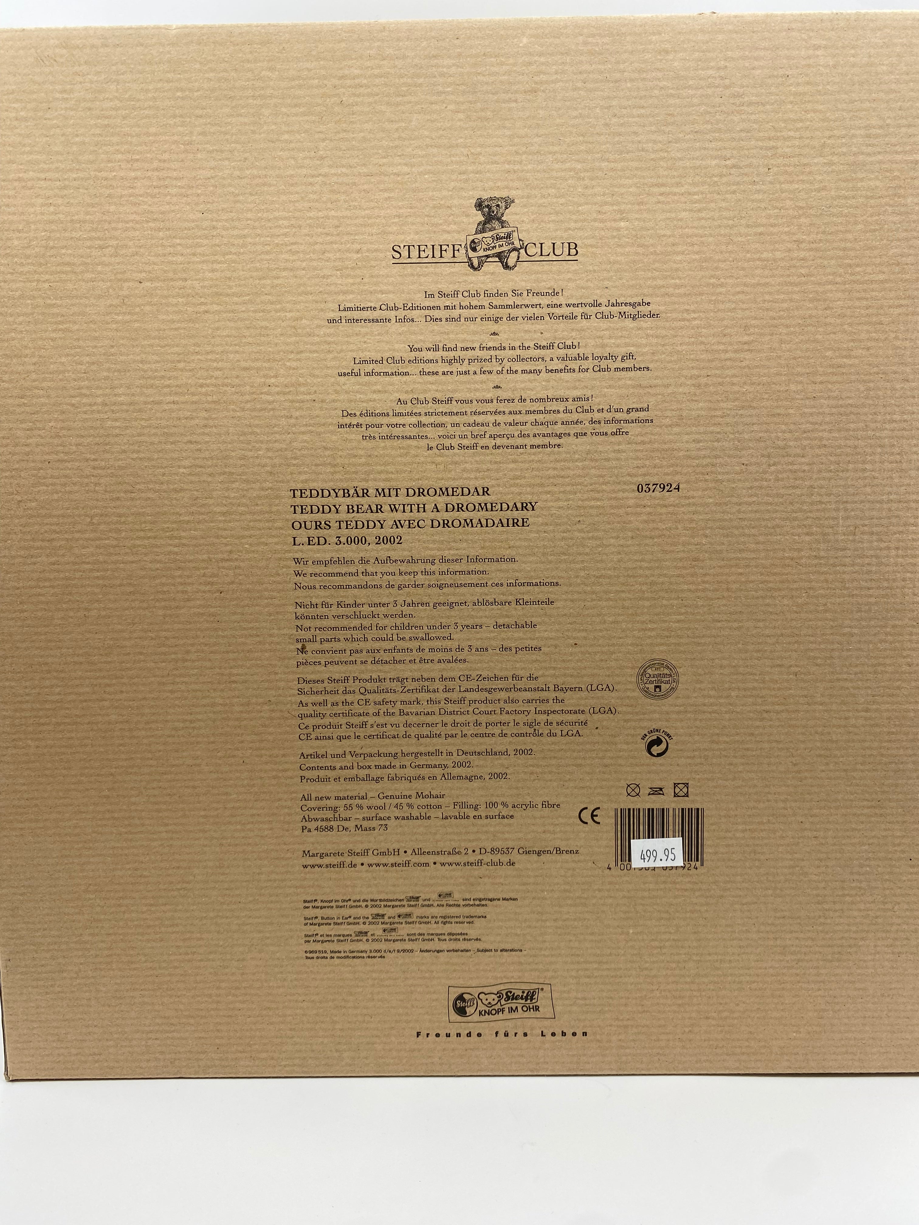 Back of a cardboard box with text and branding, featuring 'Steiff Club' on a beige background.