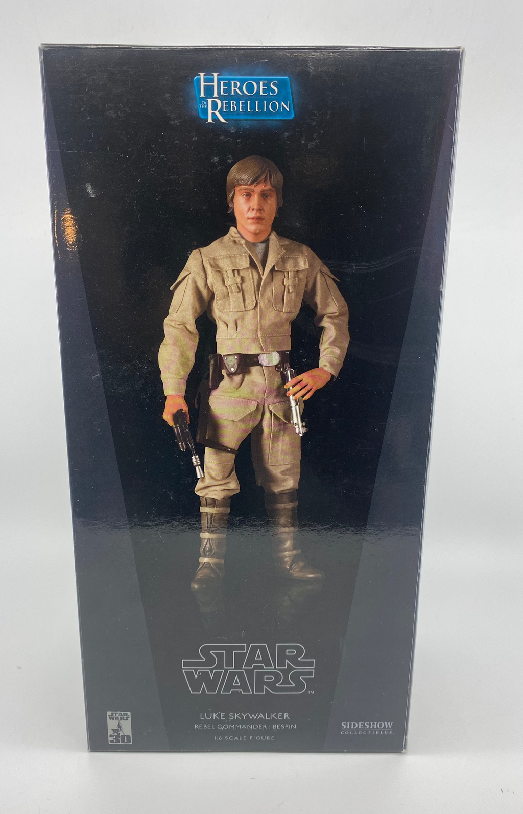 Star Wars action figure packaging with 'Heroes of Rebellion' branding on a white background