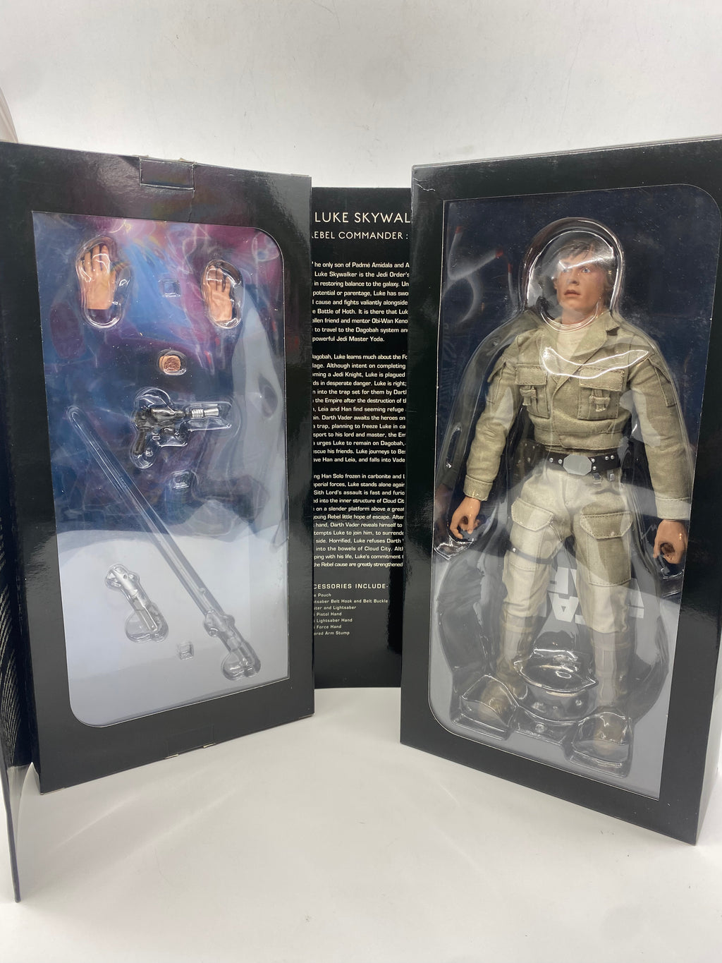 Action figure in packaging with detailed text and graphics on a white background