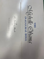 Box for the Michelle Obama Inaugural Doll with branding details.