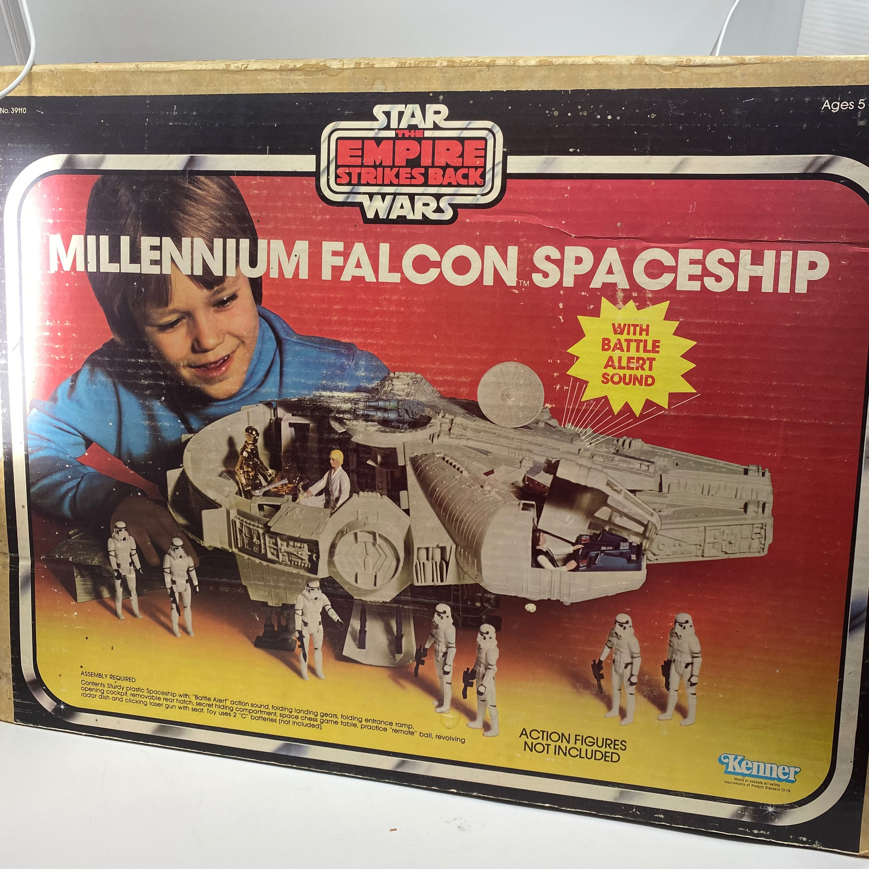 Vintage Star Wars Millennium Falcon Spaceship toy box with a child on the cover.