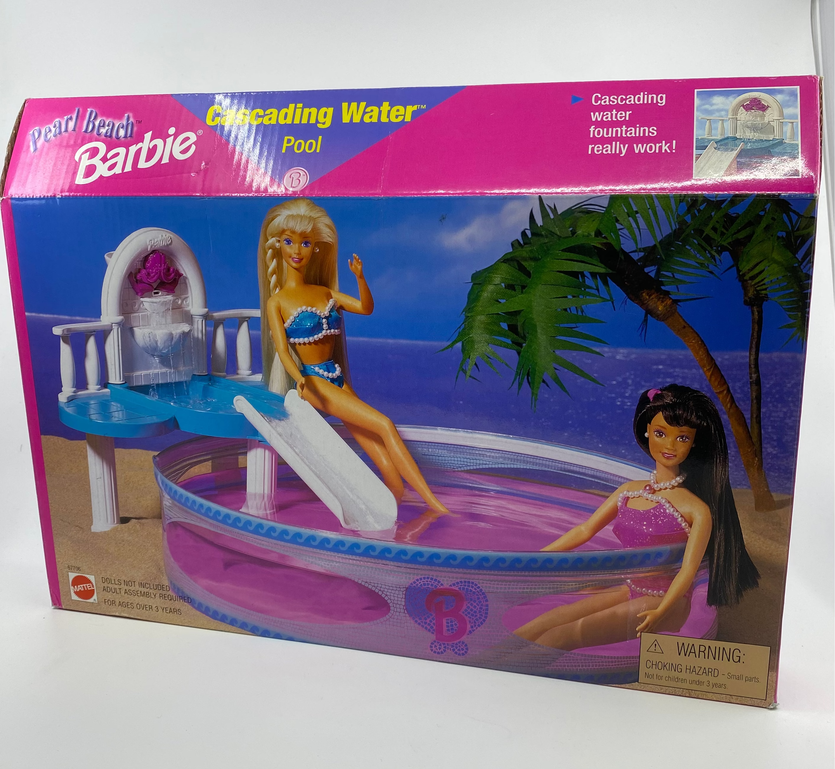 Barbie cascading water pool set packaging with two dolls on a white background