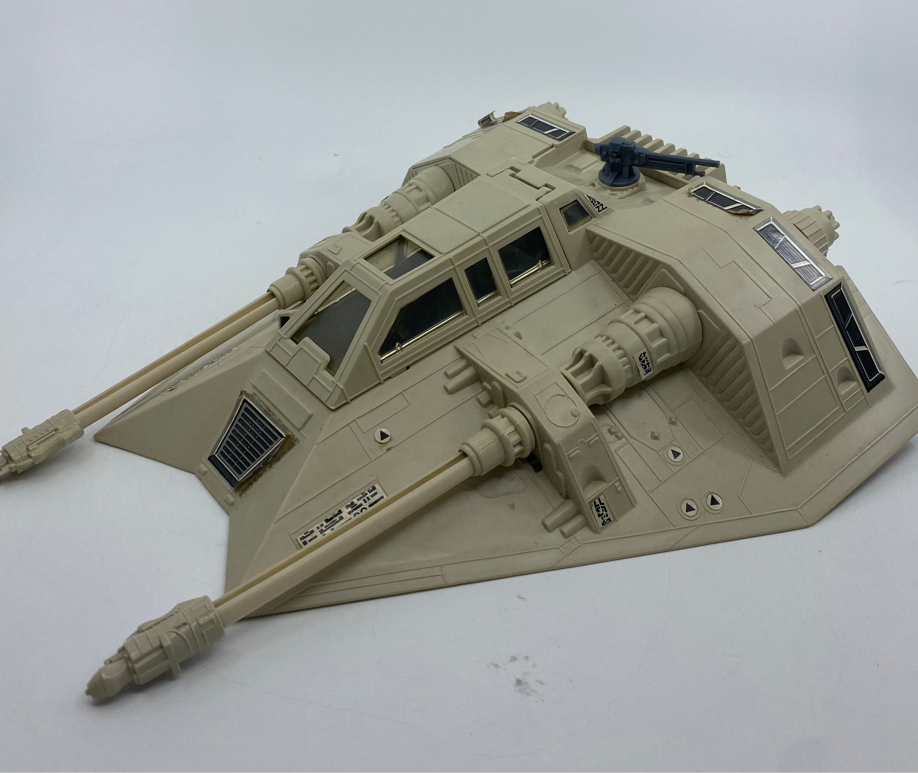 Toy model of a military vehicle on a white background