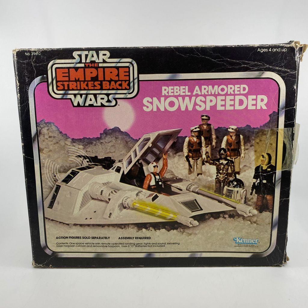 Vintage Star Wars Rebel Armored Snowspeeder toy packaging with characters and icy desert landscape illustration.