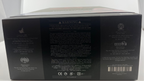 Back view of a gaming console box with text and logos on a white background