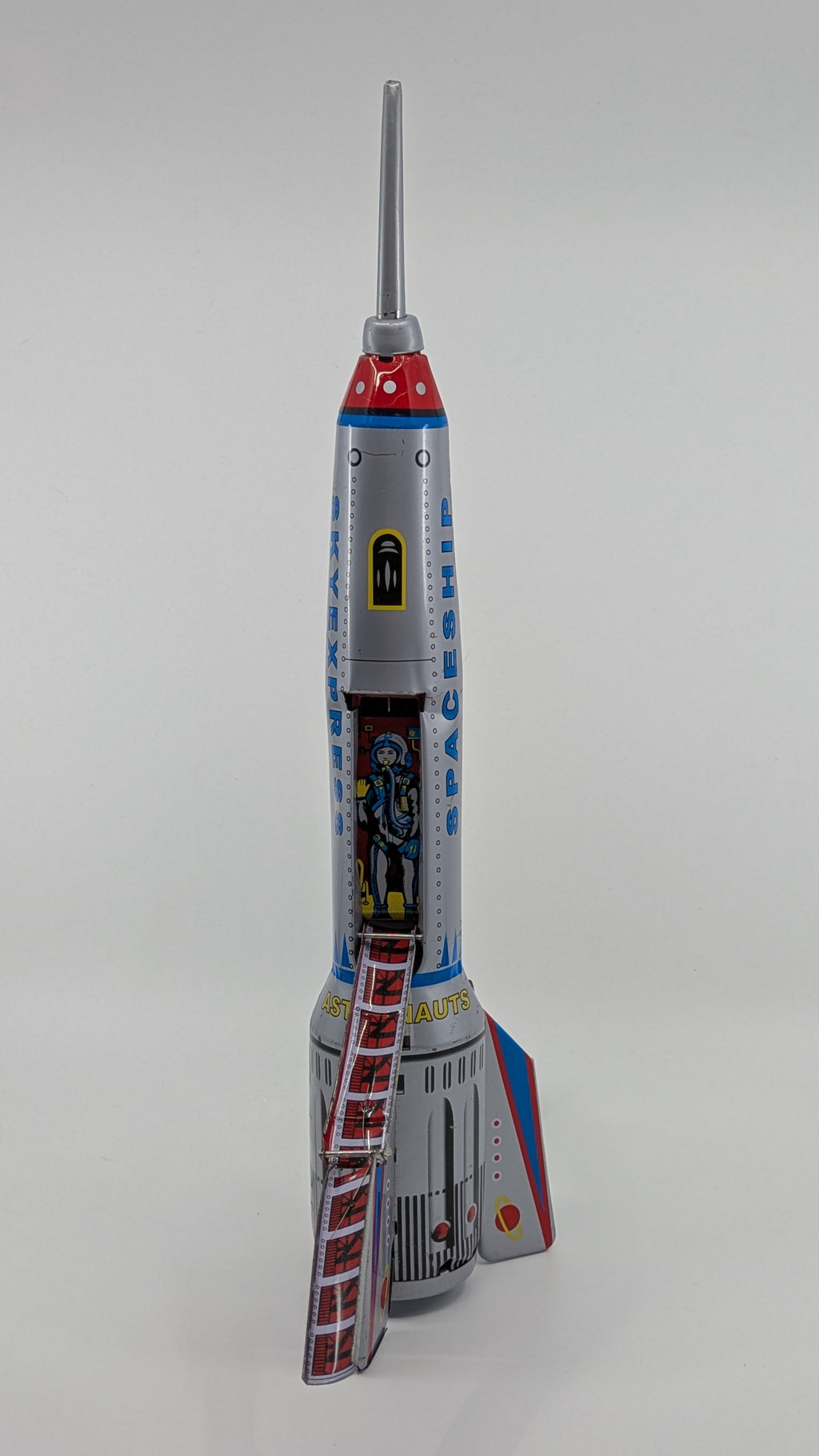 Model rocket on a gray background