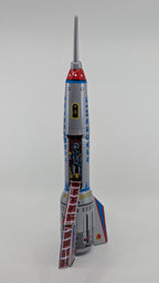 Model rocket on a gray background