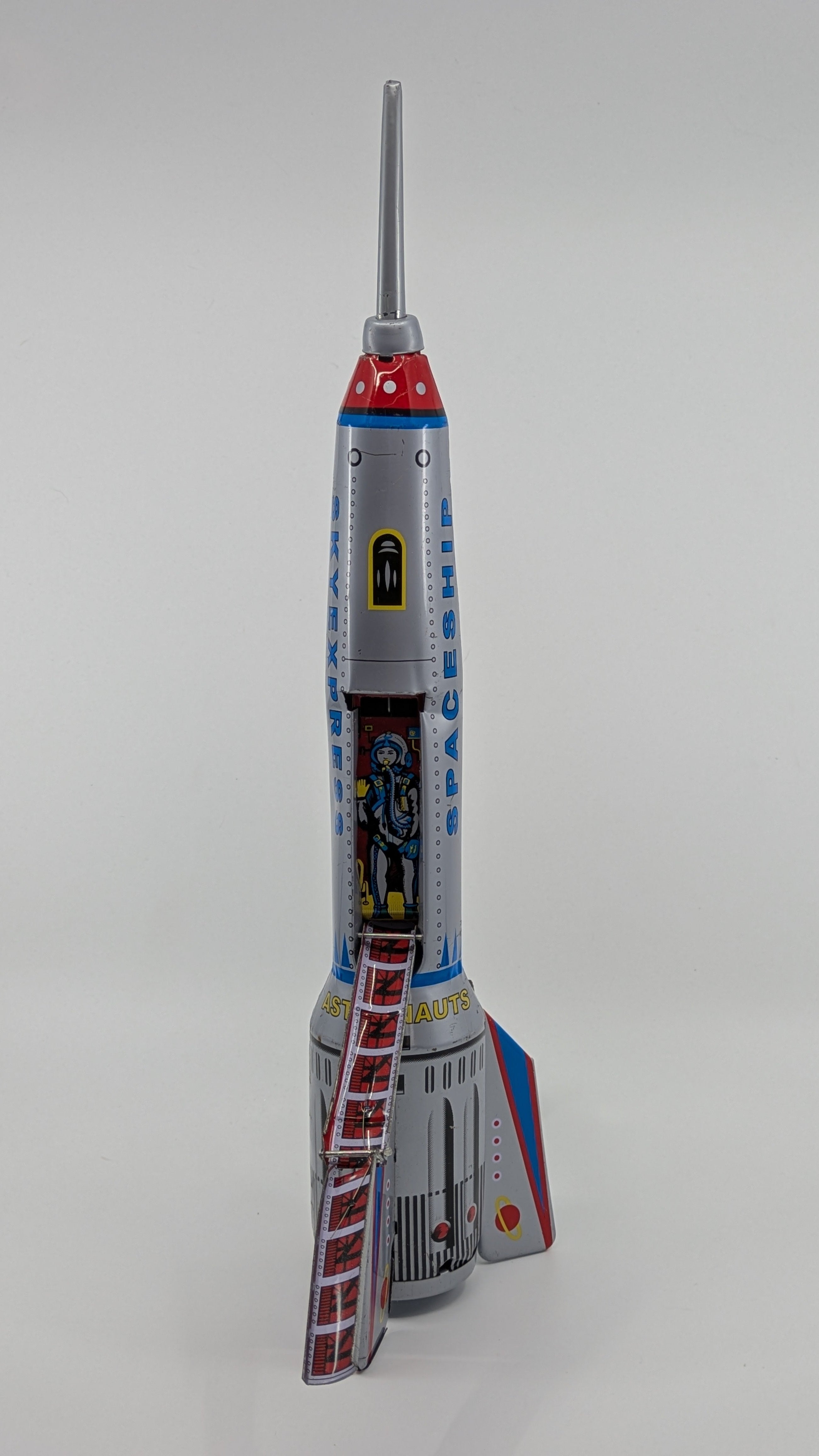 Model rocket on a gray background