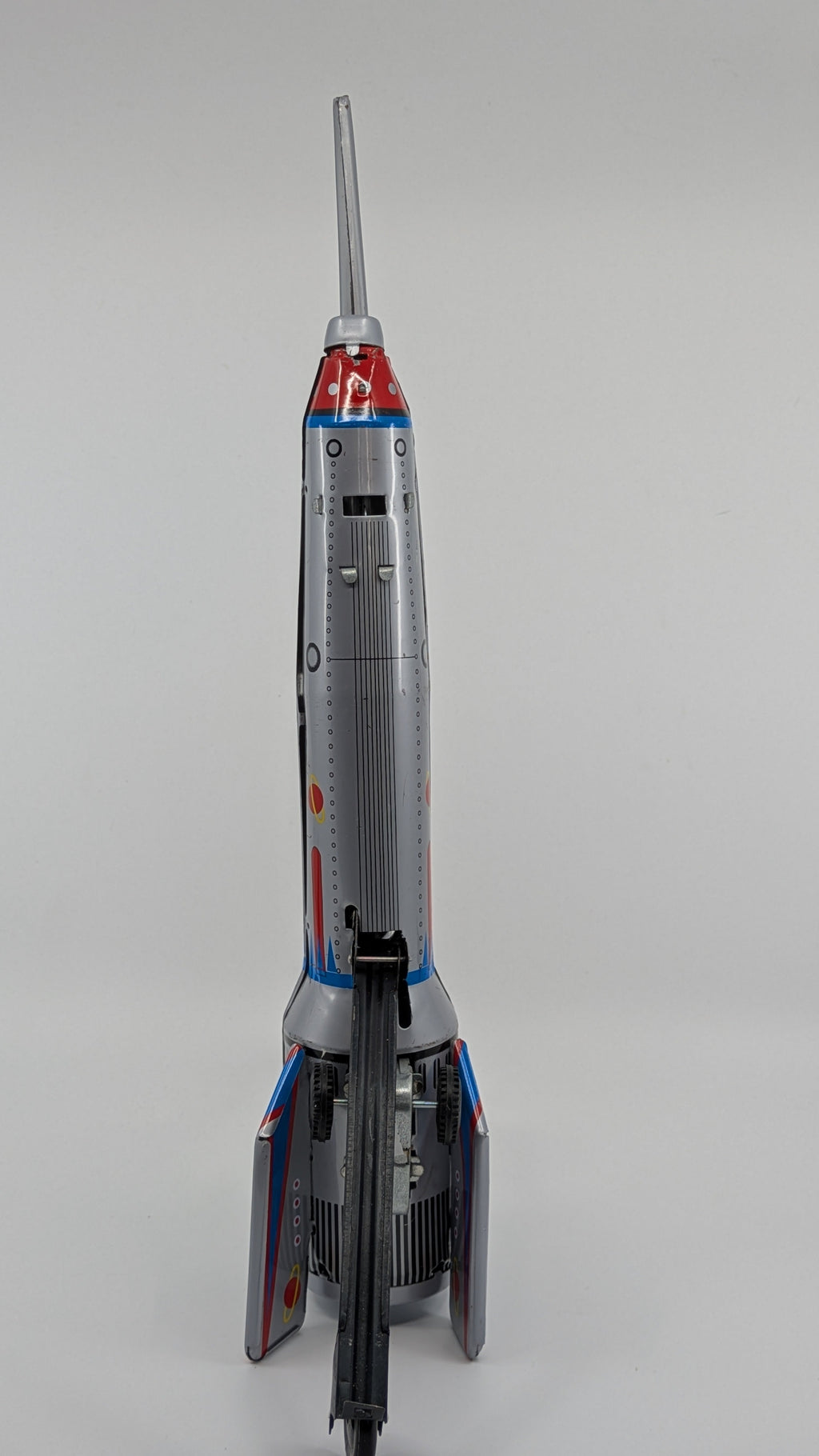 Model rocket on a gray background