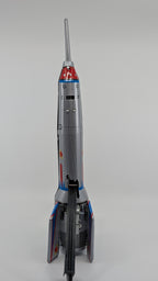 Model rocket on a gray background