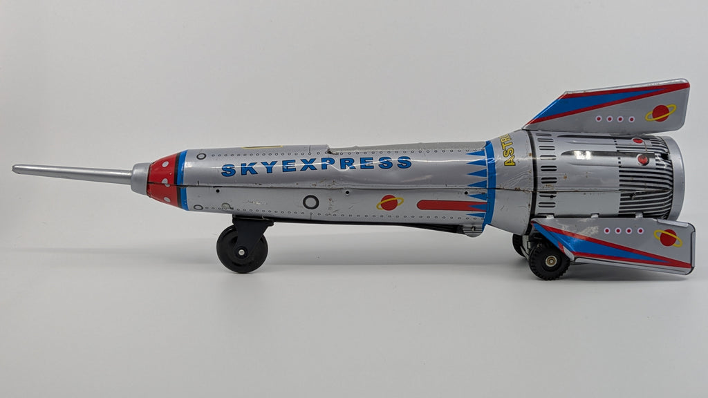 Model rocket with 'Skyexpress' branding on a gray background