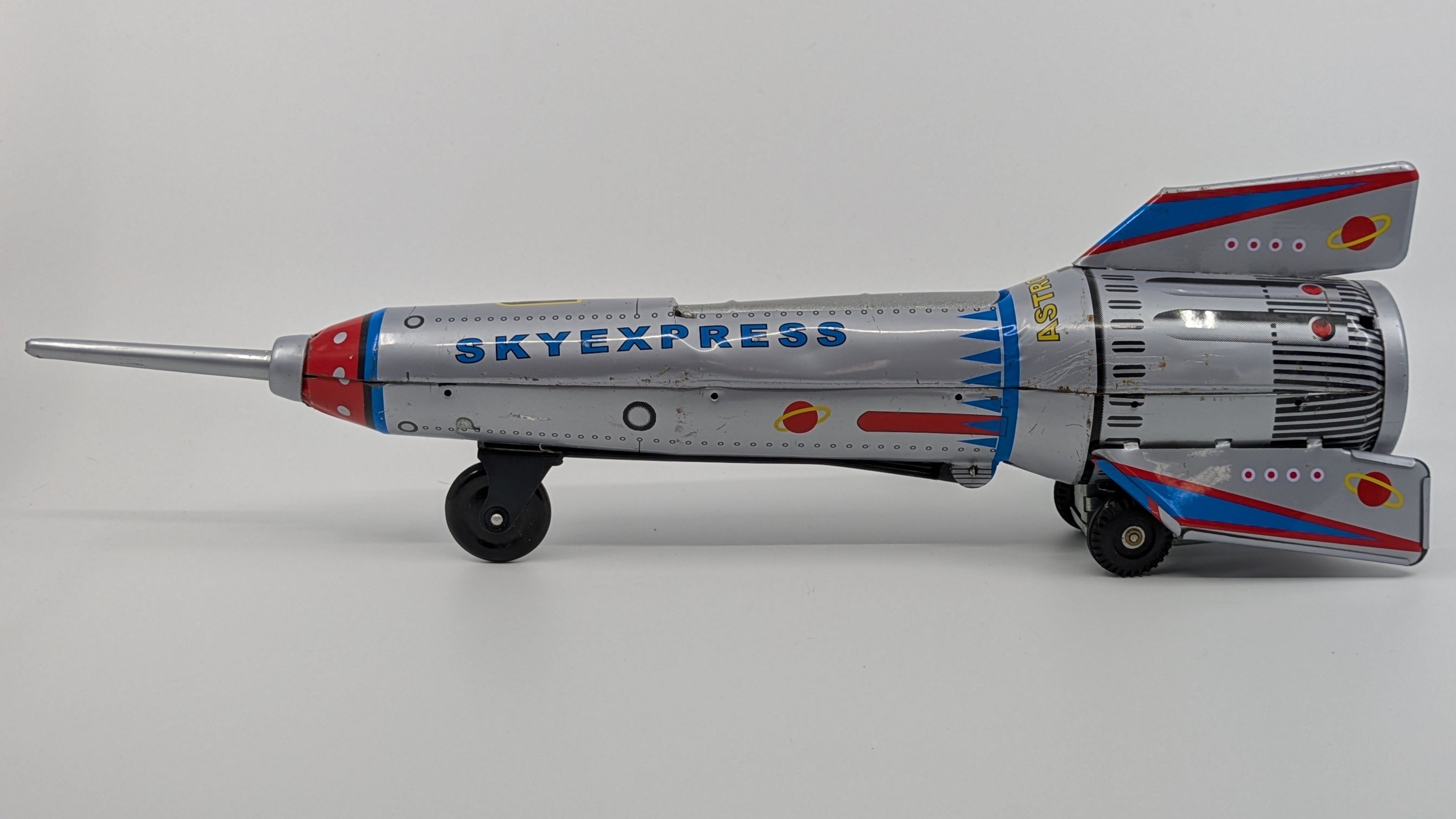 Model rocket with 'Skyexpress' branding on a gray background