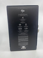 Back view of a black product packaging with text and logos on a white background