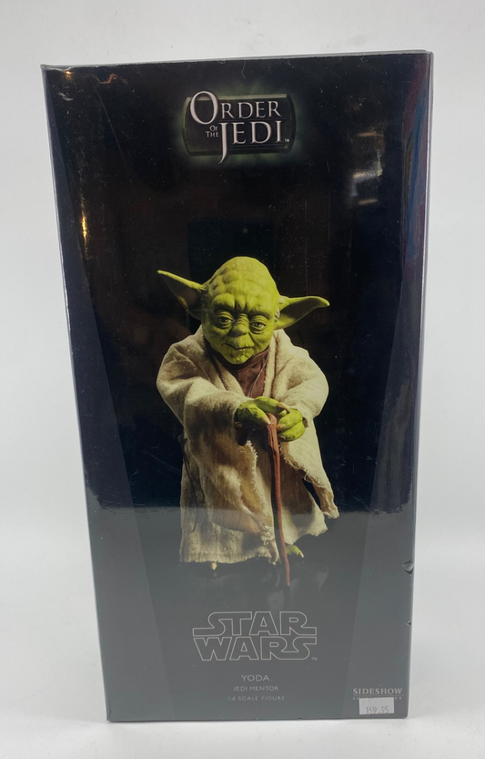 Yoda figure packaging from 'Star Wars' on a white background