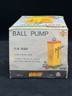 Box of a Brio ball pump toy for children on a black background