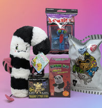 Collection of creepy-themed products including a plush toy, boxes. Deddy Bear, Five Nights at Freddy's, Snackers. 