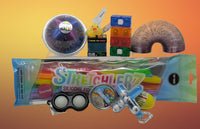 Assorted toys and novelty items including a ball, rubber duck, and stretchers 